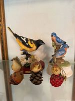 Front view of all five bird-themed items on shelf