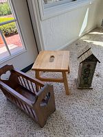 all three wooden items grouped: magazine rack, step stool, birdhouse