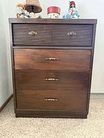 Front view showing all drawers and hardware