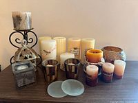 Overview of all candles and holders on tabletop