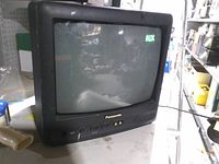 Front angled view of Panasonic CRT TV displaying AUX input