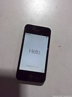 Front view of black iPhone 4s showing setup screen