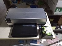 HP Deskjet 6940 printer with HP 97 ink pack on table