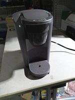 Front view showing overall unit and drip tray