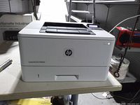 Front view of HP LaserJet Pro M402n printer