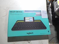 Front of retail box showing Logitech K480 multi-device keyboard image and branding