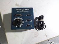 Front and top view showing knob, switches, branding