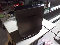 Front view of one Oreck WX1004 air purifier