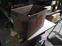 Box exterior showing shipping carton labeled Small
