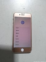 Front of rose gold iPhone 7 displaying initial setup screen