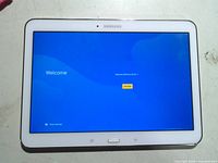 Front view of powered-on Samsung Galaxy Tab 4 tablet