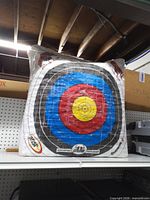 Front view of square Morrell NASP Eternity youth archery bag target showing bullseye rings and wear
