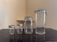 Front view showing all four jars lined up by size