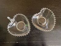 Top view of both heart dishes showing Candlewick beaded rims and round base wells