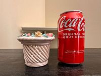 Side view showing basket height relative to soda can