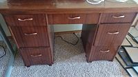 Front view of desk with drawers closed