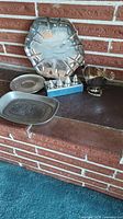 overview of all pewter items on brick hearth