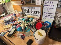 Overview of entire lot on countertop showing majority of items listed