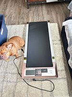 Top view of PitPat treadmill with power cord attached