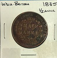 Reverse side showing EAST INDIA COMPANY, wreath, HALF ANNA