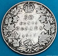 Reverse showing denomination, date, maple leaf wreath