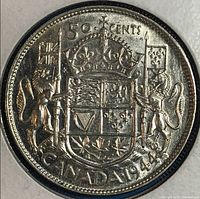 Reverse of 1944 50-cent coin showing Canadian Coat of Arms and CANADA 1944 inscription