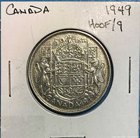 Reverse view showing date 1949 and coat of arms