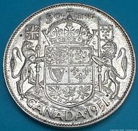 Reverse showing Canadian coat of arms with date and denomination