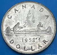Reverse showing canoe design with water lines and date 1952