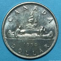 Full reverse showing Voyageur design and 1954 date