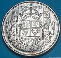 reverse of 1957 Canadian 50 cent coin showing coat of arms