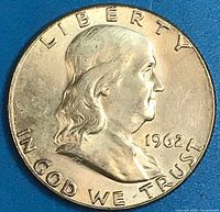 Obverse showing Benjamin Franklin portrait, LIBERTY and date 1962 visible