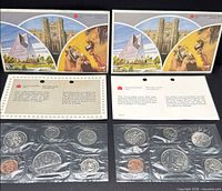 Both 1983 and 1984 sets with certificates and envelopes displayed