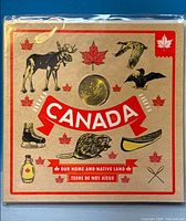 Front of sealed Home and Native Land coin set package