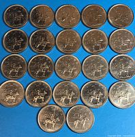Grid view of 22 RCMP 1973 quarters obverse sides