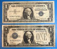 Both $1 silver certificates side by side showing fronts