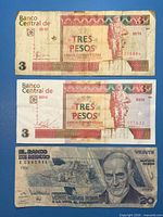 Fronts of two Cuba 3 pesos notes and one Mexico 20 nuevos pesos note
