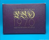 Front of purple cardboard sleeve with gold text