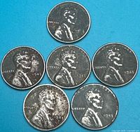 Obverse view of six 1943 steel Lincoln cents