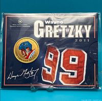 Front of sealed package showing coin, Gretzky name, number 99