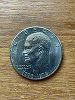 Obverse showing Eisenhower portrait, LIBERTY legend, dual date 1776-1976