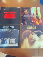 Front covers of all four LPs displayed