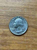 Obverse of quarter showing Washington portrait and dates
