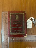 Front cover view showing brand text and size reference ruler