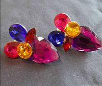 front view of both earrings showing multicolour faceted stones