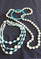 All four jewellery pieces laid out
