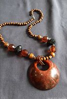 Full necklace showing bead pattern and pendant