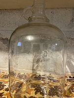 Full view of clear glass demijohn front