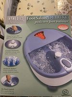 Front of FootSalon Deluxe retail box showing product image and branding