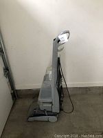 Full side view of Hoover SteamVac carpet cleaner showing overall unit condition.